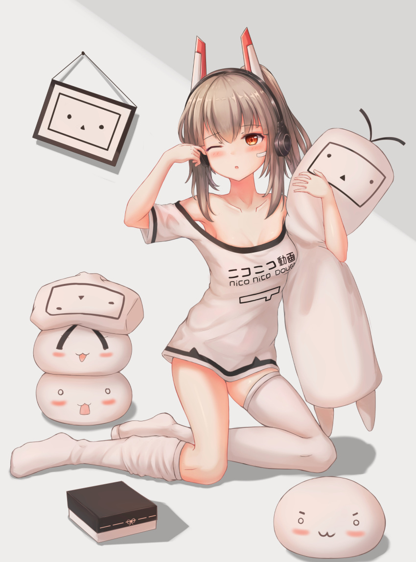 1girl alternate_hairstyle ayanami_(azur_lane) azur_lane bare_shoulders blush brown_eyes brown_hair casual clothes_writing dakimakura_(object) highres long_hair looking_at_viewer one_eye_closed open_mouth pillow pillow_hug ponytail shirt solo t-shirt