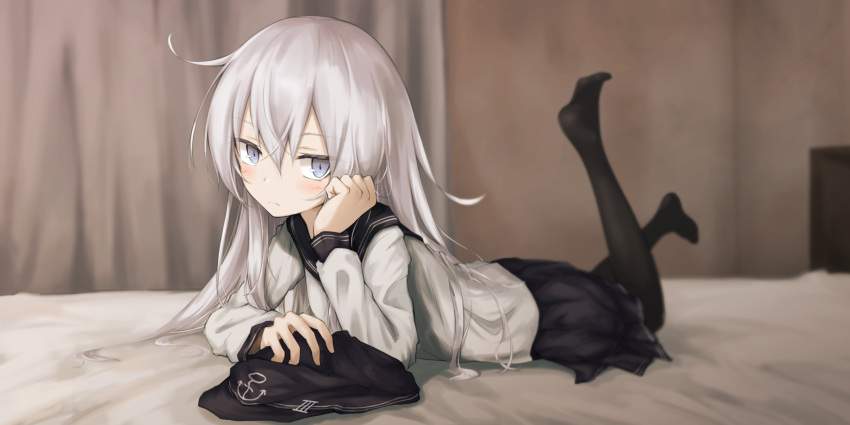 1girl anchor_symbol black_legwear black_skirt blue_eyes blush chin_rest closed_mouth dress eyebrows_visible_through_hair hair_between_eyes hat hat_removed headwear_removed hibiki_(kantai_collection) highres indoors kantai_collection legs_up lit_ter long_hair long_sleeves looking_at_viewer lying miniskirt neckerchief no_shoes on_bed on_stomach pantyhose peaked_cap roman_numerals school_uniform serafuku shirt silver_hair skirt solo white_shirt