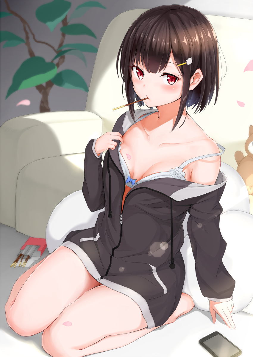 1girl absurdres bangs bare_shoulders black_hair black_jacket blush bra bra_slip cellphone collarbone couch eating eyebrows_visible_through_hair food hair_ornament hairclip highres indoors jacket lens_flare looking_at_viewer maeshimashi mouth_hold off_shoulder original phone plant pocky red_eyes seiza short_hair sitting smartphone solo strap_slip stuffed_animal stuffed_toy teddy_bear underwear white_bra