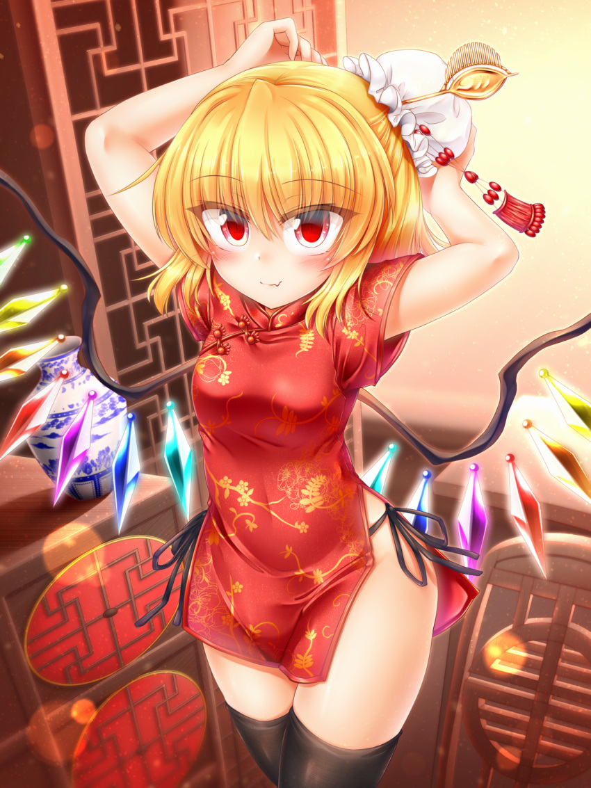 1girl black_legwear blonde_hair blush breasts bun_cover china_dress chinese_clothes commentary_request cowboy_shot dress eyebrows_visible_through_hair fang_out flandre_scarlet hair_bun hair_ornament hair_stick highres indoors legs_together light_particles looking_at_viewer m9kndi no_panties red_dress red_eyes short_hair short_sleeves small_breasts smile solo standing thigh-highs touhou tying_hair vase wings