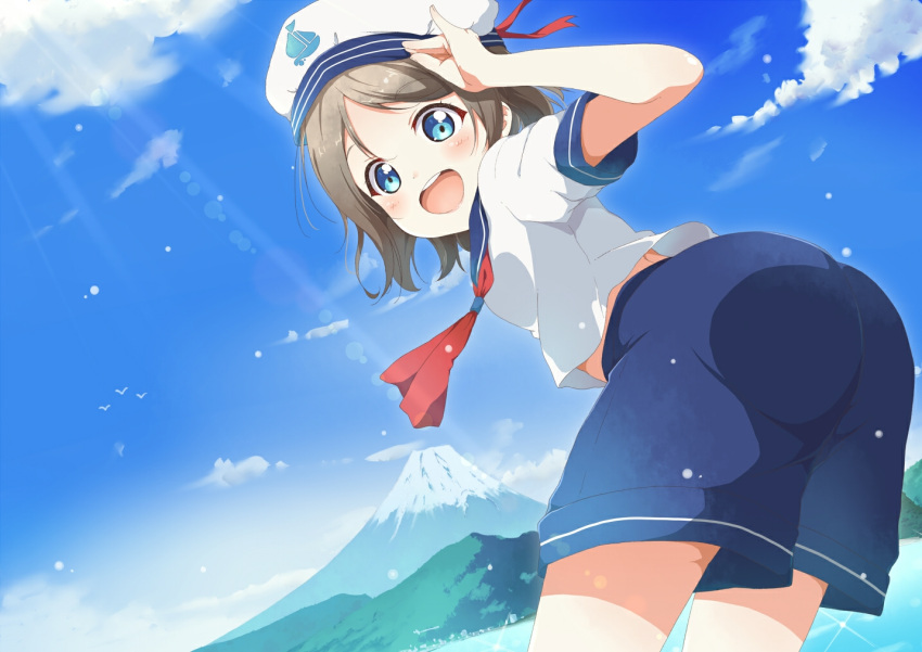 1girl :d bent_over blue_eyes blue_shorts commentary_request grey_hair hat hat_ribbon lens_flare looking_at_viewer love_live! love_live!_sunshine!! mount_fuji neckerchief open_mouth pinky_out red_neckwear red_ribbon ribbon salute school_uniform serafuku short_hair shorts smile solo sun_beam toma_(shinozaki) watanabe_you