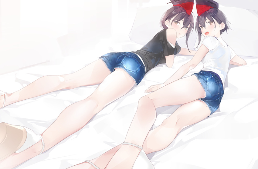 2girls ama_mitsuki ass asymmetrical_hair bangs bare_legs bed_sheet black_shirt breasts casual closed_mouth commentary_request denim denim_shorts headgear i-13_(kantai_collection) i-14_(kantai_collection) kantai_collection kneepits looking_at_viewer looking_back lying multiple_girls on_bed on_side on_stomach open_mouth shirt short_hair short_shorts short_sleeves shorts shoulder_cutout small_breasts white_footwear white_pillow white_shirt yellow_eyes