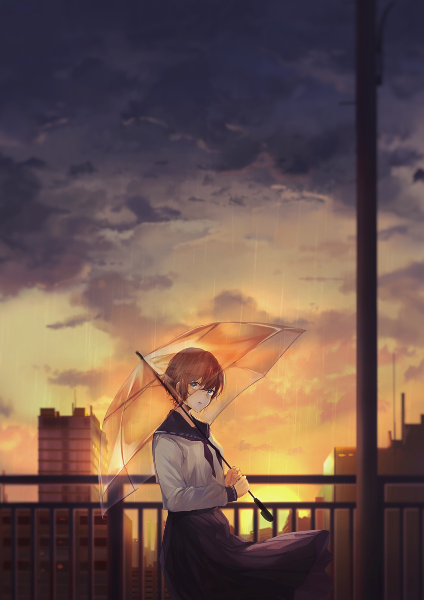 1girl absurdres akito_(d30n26) bangs blue_eyes brown_hair building city clouds cloudy_sky eyebrows_visible_through_hair fence highres holding holding_umbrella long_sleeves looking_at_viewer neckerchief original outdoors parted_lips pleated_skirt rain red_neckwear school_uniform serafuku short_hair skirt sky solo standing sun sunset transparent_umbrella umbrella wind