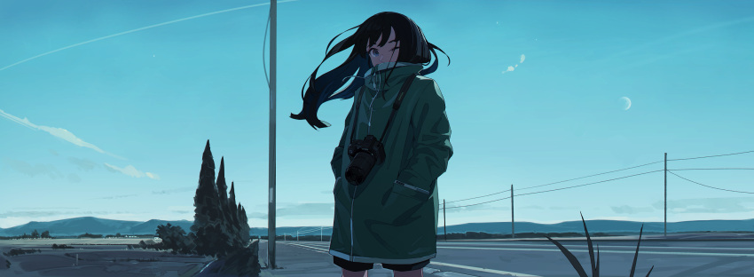 1girl bangs black_hair black_shorts blue_eyes blue_sky camera clouds condensation_trail covered_mouth cowboy_shot day fir_tree floating_hair green_coat hands_in_pockets high_collar highres kamameshi_gougoumaru long_hair moon mountainous_horizon one_eye_closed original outdoors pocket power_lines road scenery shorts sky solo standing street tree wind