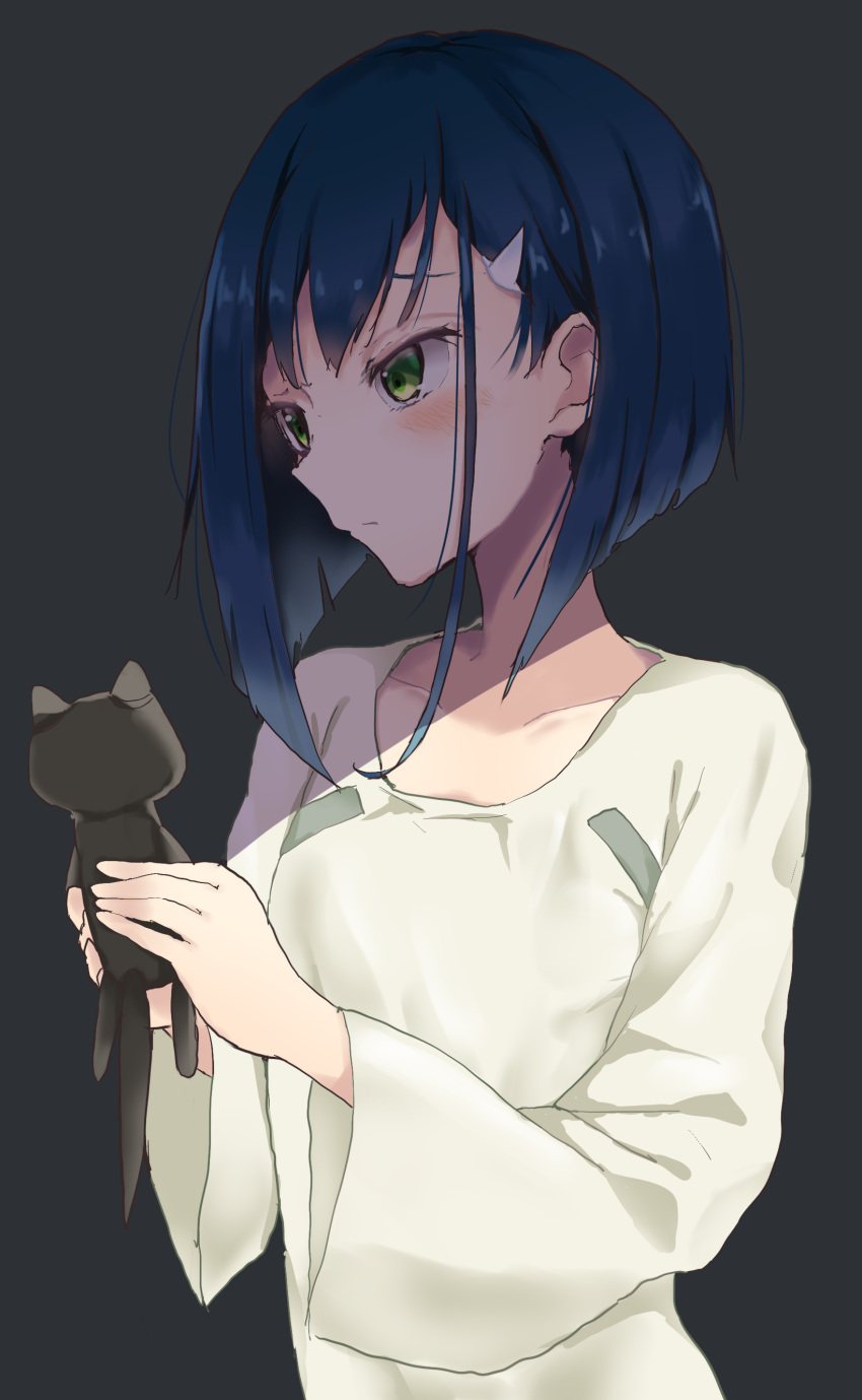 1girl absurdres bangs black_background blue_hair blush collarbone darling_in_the_franxx hair_ornament hairclip highres holding ichigo_(darling_in_the_franxx) light long_sleeves nightgown seseri7th short_hair simple_background solo stuffed_animal stuffed_cat stuffed_toy two-handed upper_body wide_sleeves