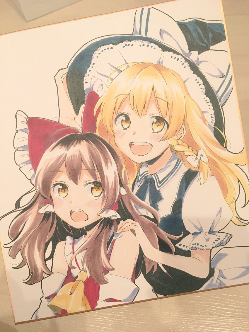 2girls :d :o ascot bare_shoulders black_hat black_neckwear black_ribbon black_vest blonde_hair bow brown_hair commentary_request detached_sleeves eyebrows_visible_through_hair frilled_hat frills hair_bow hair_tubes hakurei_reimu hand_on_another's_shoulder hand_on_headwear hat hat_bow highres japanese_clothes kirisame_marisa looking_at_viewer multiple_girls neck_ribbon open_mouth photo puffy_short_sleeves puffy_sleeves red_bow red_vest ribbon round_teeth short_sleeves smile teeth touhou vanilla_(miotanntann) vest white_bow yellow_eyes yellow_neckwear