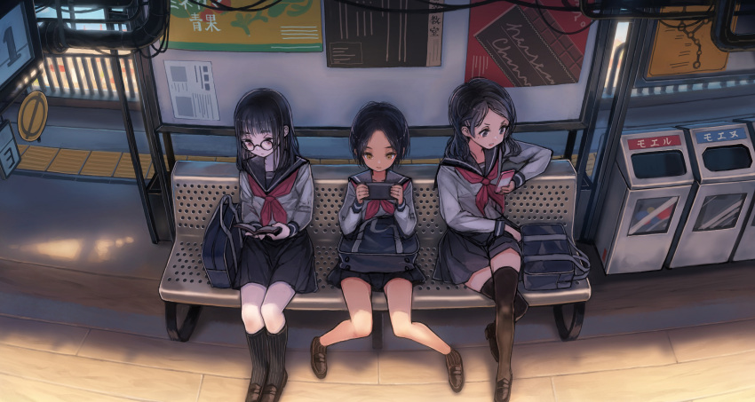 3girls absurdres bag black_legwear book brown_eyes cellphone glasses handheld_game_console highres kneehighs knees_together_feet_apart legs_crossed loafers long_hair mole mole_under_eye multiple_girls original outdoors phone playstation_portable pleated_skirt reading school_bag school_uniform serafuku shoes short_hair sitting skirt smartphone thigh-highs train_station trash_can window1228