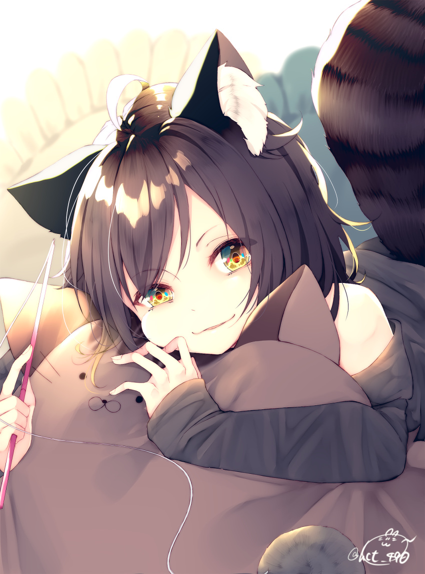 1girl ahoge animal_ears bangs bare_shoulders black_shirt blurry blurry_background brown_hair cat_pillow chita_(ketchup) commentary_request depth_of_field eyebrows_visible_through_hair fingernails highres holding long_sleeves looking_at_viewer object_hug off_shoulder original parted_lips pillow shirt signature sleeves_past_wrists smile solo tail white_background yellow_eyes