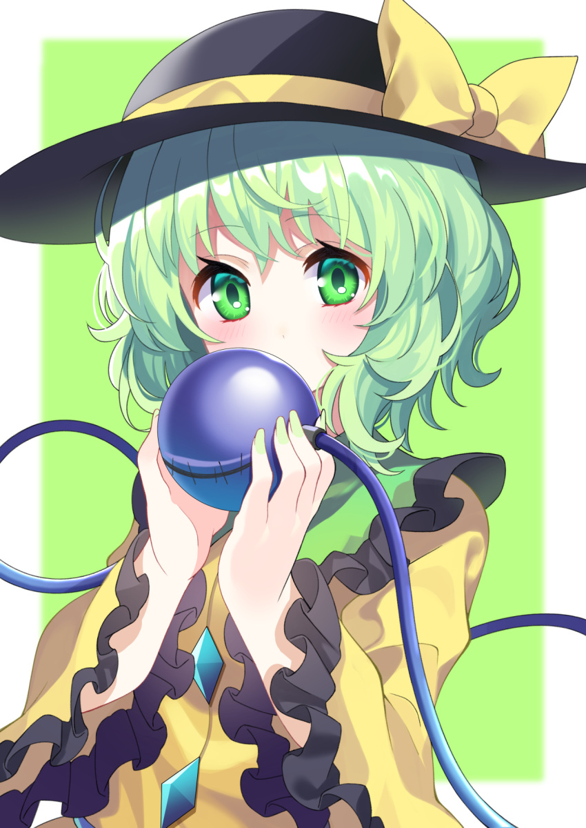 1girl black_headwear blush border bow buttons collared_shirt commentary_request covered_mouth diamond_button eyeball eyebrows_visible_through_hair eyelashes frilled_shirt_collar frilled_sleeves frills green_background green_eyes green_hair hat hat_bow highres holding komeiji_koishi long_sleeves shirt short_hair simple_background solo sun_hat third_eye touhou upper_body white_border wide_sleeves yellow_bow yellow_shirt yuujin_(yuzinn333)