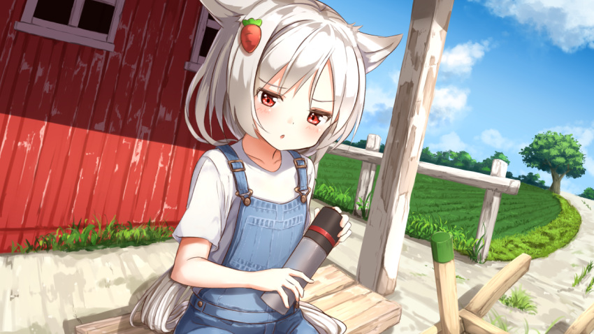 1girl ame. animal_ears azur_lane barn blue_sky carrot_hair_ornament clouds collarbone commentary_request day dutch_angle fence field food_themed_hair_ornament hair_ornament holding long_hair looking_at_viewer montpelier_(azur_lane) outdoors overalls shirt short_sleeves silver_hair sitting sky solo thermos tree very_long_hair white_shirt