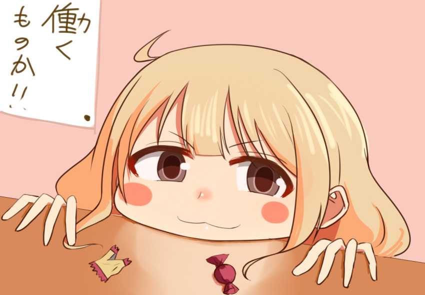 1girl :3 bangs blonde_hair blush_stickers brown_eyes candy_wrapper closed_mouth commentary_request eyebrows_visible_through_hair fingers futaba_anzu head idolmaster idolmaster_cinderella_girls long_hair looking_at_viewer smile solo table taka_(takahirokun) translated v-shaped_eyebrows