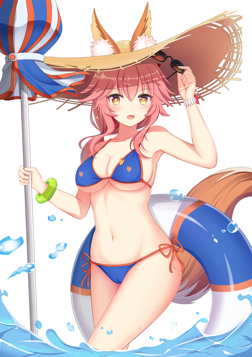 1girl animal_ears bikini blue_bikini breasts ears_through_headwear fate/grand_order fate_(series) fox_ears fox_tail hat highres holding holding_umbrella innertube large_breasts long_hair looking_at_viewer muq navel parasol pink_hair side-tie_bikini sky solo sun_hat sunglasses swimsuit tail tamamo_(fate)_(all) tamamo_no_mae_(swimsuit_lancer)_(fate) umbrella wading yellow_eyes