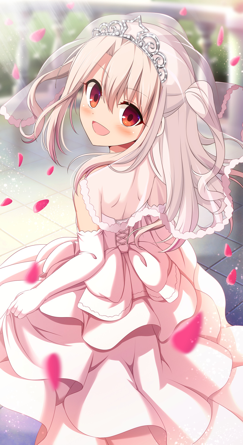 1girl :d backless_outfit bare_shoulders blonde_hair blush bridal_veil commentary_request diadem dress elbow_gloves eyebrows_visible_through_hair fate/kaleid_liner_prisma_illya fate_(series) from_behind gloves hair_between_eyes highres illyasviel_von_einzbern long_hair looking_at_viewer looking_back morokoshi_(tekku) open-back_dress open_mouth petals red_eyes shoulder_blades skirt_hold smile solo strapless strapless_dress tile_floor tiles two_side_up veil wedding_dress white_dress white_gloves