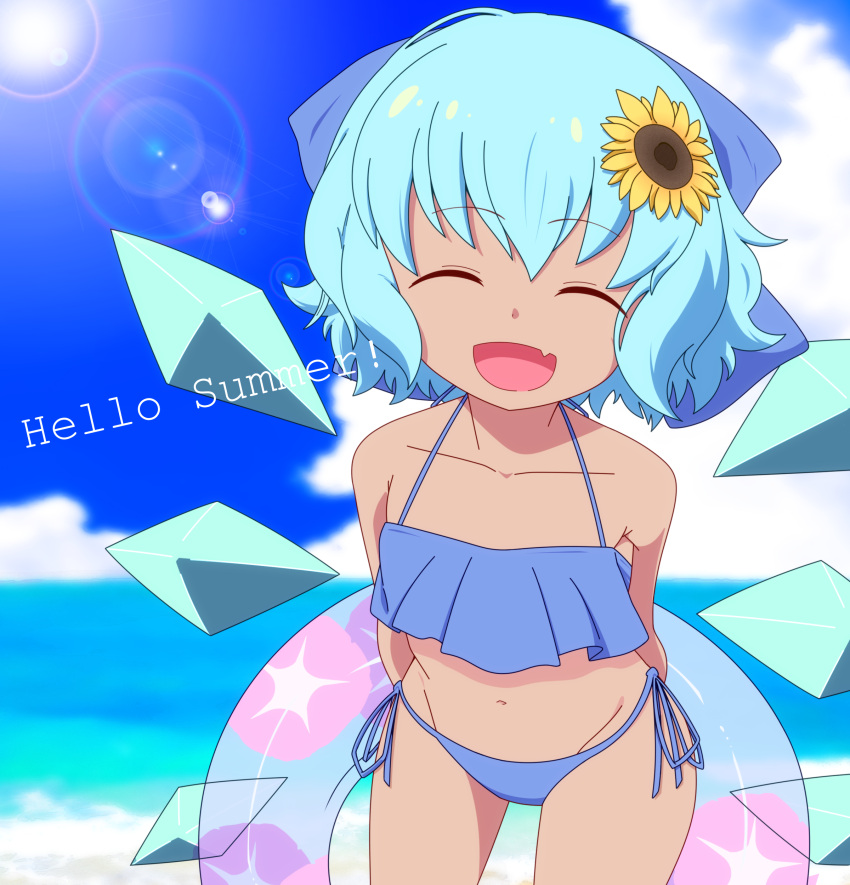 1girl :d absurdres aqua_hair arms_behind_back bangs bare_shoulders beach bikini blue_bikini blue_bow blue_sky bow cirno clouds cloudy_sky collarbone commentary_request cowboy_shot day english eyebrows_visible_through_hair facing_viewer fang flower groin hair_bow hair_flower hair_ornament halterneck highres ice ice_wings innertube leaning_forward lens_flare open_mouth outdoors shikabane_homura short_hair side-tie_bikini sky smile solo standing summer sun sunflower sunlight swimsuit tan tanned_cirno tongue touhou wings