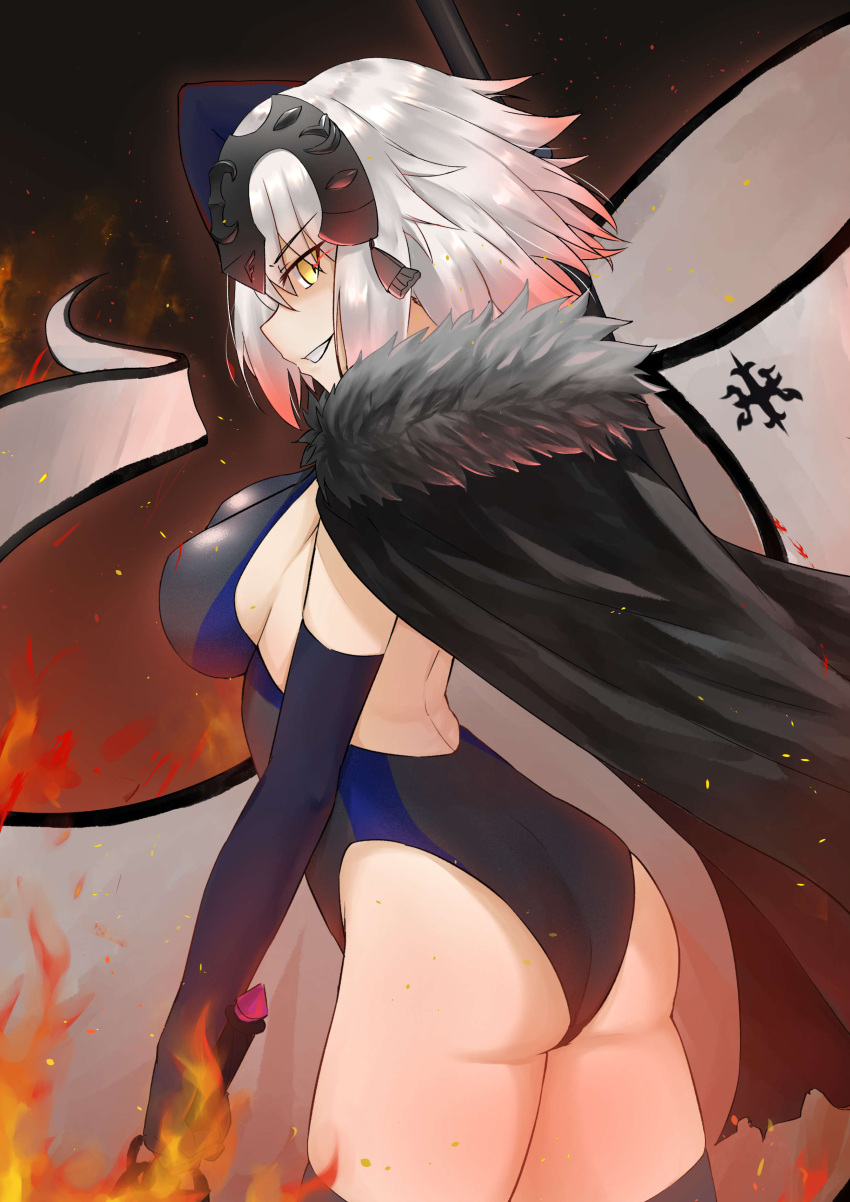 1girl absurdres arched_back ass backlighting bangs banner black_cape black_legwear breasts cape competition_swimsuit eyebrows_visible_through_hair fate/grand_order fate_(series) fire from_side fur_trim grin headpiece highres holding holding_sword holding_weapon jeanne_d'arc_(alter)_(fate) jeanne_d'arc_(fate)_(all) large_breasts looking_at_viewer looking_back m_kong one-piece_swimsuit short_hair sideboob silver_hair smile solo swimsuit sword thigh-highs thighs weapon yellow_eyes