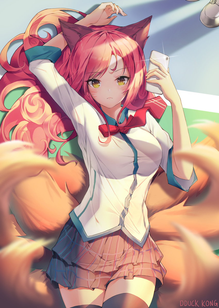 1girl ahri animal_ears arm_up bangs black_legwear blurry blurry_background blush bow bowtie brown_eyes closed_mouth commentary depth_of_field eyebrows_visible_through_hair facial_mark fox_ears fox_girl fox_tail grey_skirt highres kyuubi layered_skirt league_of_legends lee_seok_ho long_hair looking_at_viewer multiple_tails necktie pink_hair pleated_skirt red_neckwear shirt short_sleeves skirt solo tail thigh-highs very_long_hair whisker_markings white_shirt