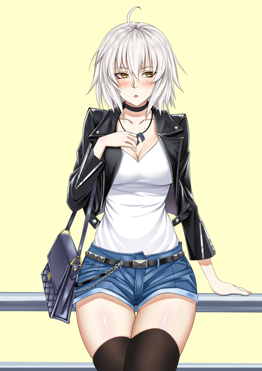 1girl :o absurdres against_railing ahoge bag bangs black_belt black_choker black_jacket black_legwear blue_shorts blush breasts chains choker cleavage collarbone contemporary cowboy_shot cropped_jacket denim denim_shorts eyebrows_visible_through_hair fate/grand_order fate_(series) grey_hair hair_between_eyes hand_on_own_chest hand_up handbag highres jacket jeanne_d'arc_(alter)_(fate) jeanne_d'arc_(fate)_(all) jewelry large_breasts long_sleeves looking_away medium_hair necklace open_clothes open_jacket shiny shiny_hair shiny_skin shirt shirt_tucked_in short_shorts shorts simple_background solo standing thigh-highs thigh_gap white_shirt xiao_gen yellow_background yellow_eyes