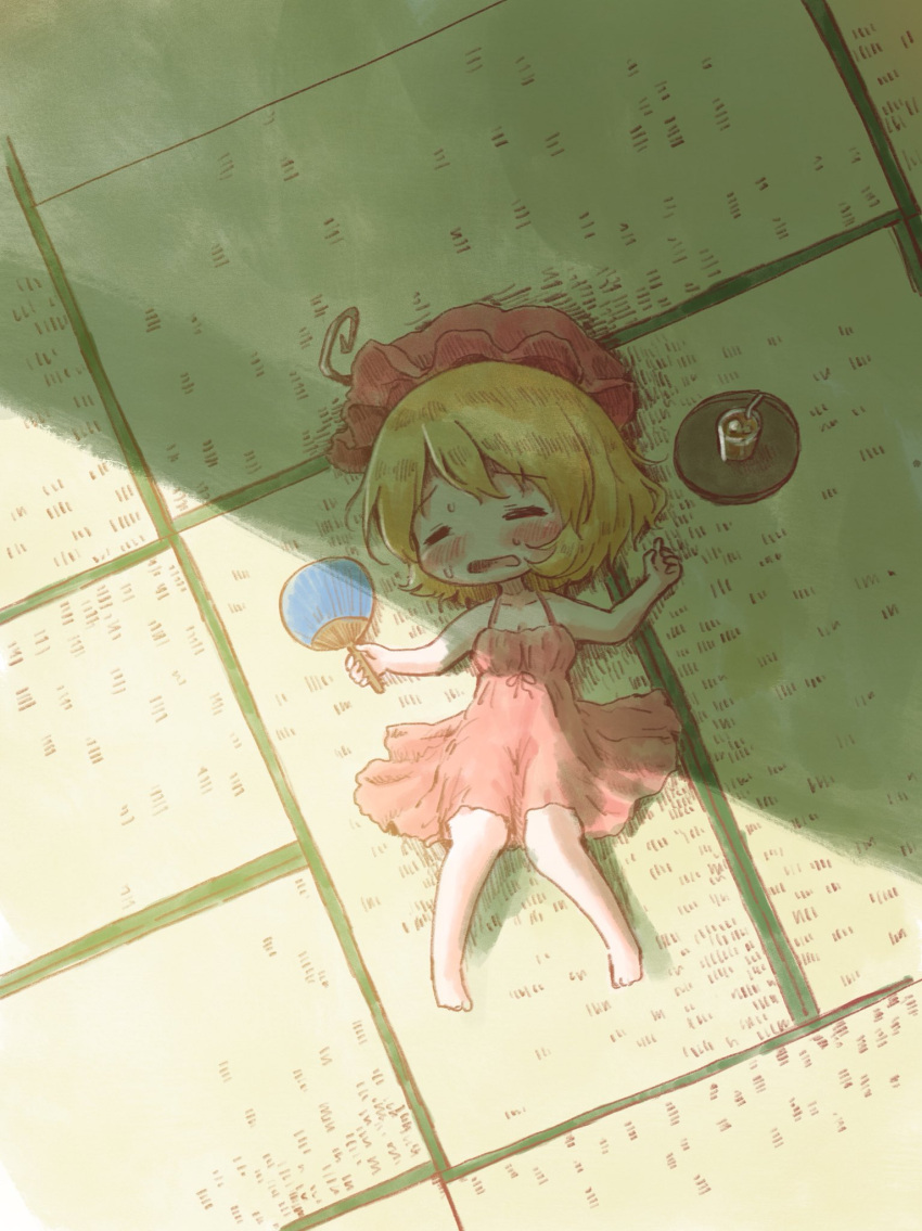 1girl aki_minoriko arinu bare_shoulders barefoot blonde_hair blush bow closed_eyes collarbone commentary_request dress drinking_straw fan full_body hat highres ice ice_cube iced_tea lying mob_cap on_back open_mouth paper_fan red_bow red_dress red_hat short_hair solo sundress sweat sweatdrop tatami tea touhou tray uchiwa