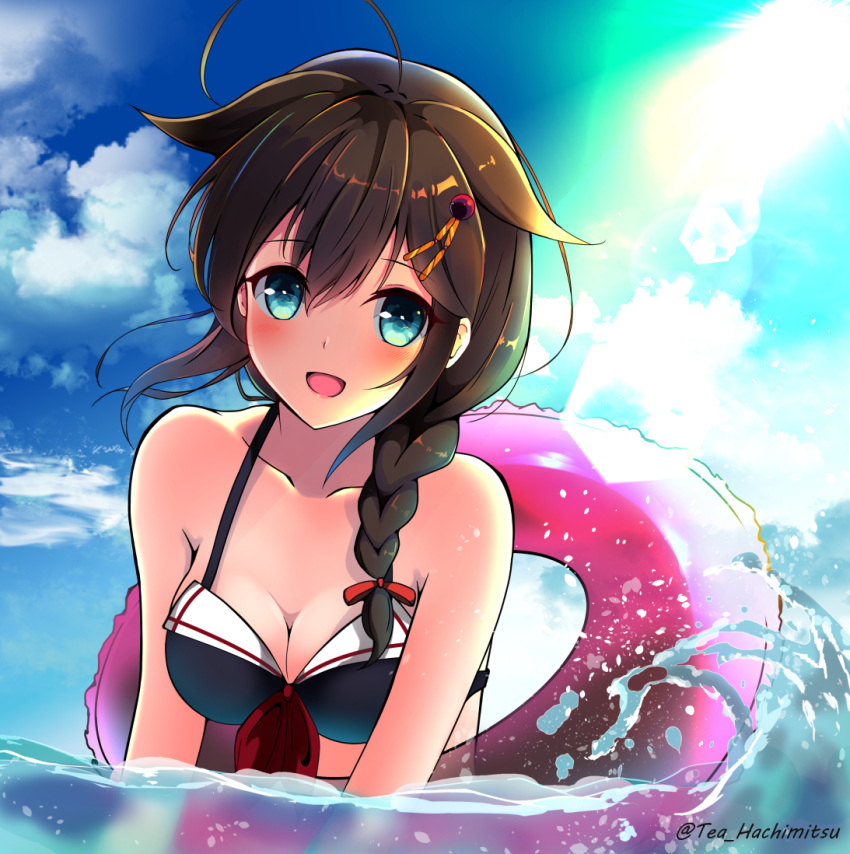 1girl :d ahoge alternate_costume amagami_(makise_tsubaki) bangs bikini blue_eyes blue_sky blush braid breasts brown_hair cleavage clouds eyebrows_visible_through_hair hair_flaps hair_ornament hair_over_shoulder in_water innertube kantai_collection long_hair open_mouth outdoors partially_submerged remodel_(kantai_collection) ribbon shigure_(kantai_collection) sidelocks single_braid sky smile solo sunlight swimsuit twitter_username upper_body
