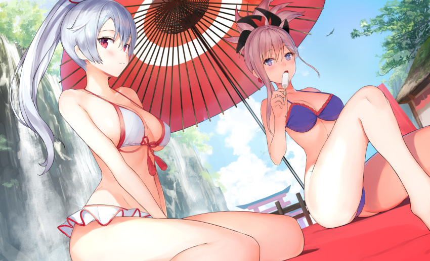2girls bangs bare_arms bare_shoulders between_legs bikini blue_sky blush breasts cleavage cliff closed_mouth clouds commentary_request day eyebrows_visible_through_hair fate/grand_order fate_(series) food hair_between_eyes hair_ornament hand_between_legs high_ponytail holding holding_food long_hair looking_at_viewer medium_breasts miyamoto_musashi_(fate/grand_order) multiple_girls nanotaro open_mouth oriental_umbrella outdoors pink_hair ponytail popsicle purple_bikini red_eyes red_umbrella silver_hair sitting sky smile swimsuit tomoe_gozen_(fate/grand_order) torii tree umbrella violet_eyes wariza water waterfall white_bikini