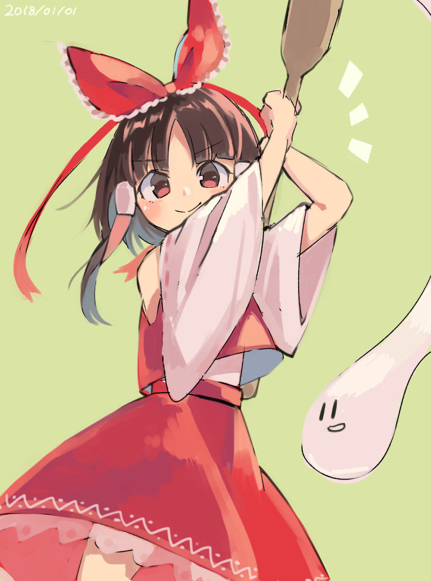 1girl blush bow brown_hair closed_mouth commentary_request dated detached_sleeves eyebrows_visible_through_hair food green_background hair_bow hair_tubes hakurei_reimu highres holding long_sleeves looking_at_viewer mochi mochi_(touhou) mochitsuki red_bow red_eyes red_skirt red_vest sasa_kichi simple_background skirt smile solo standing touhou vest wagashi wide_sleeves