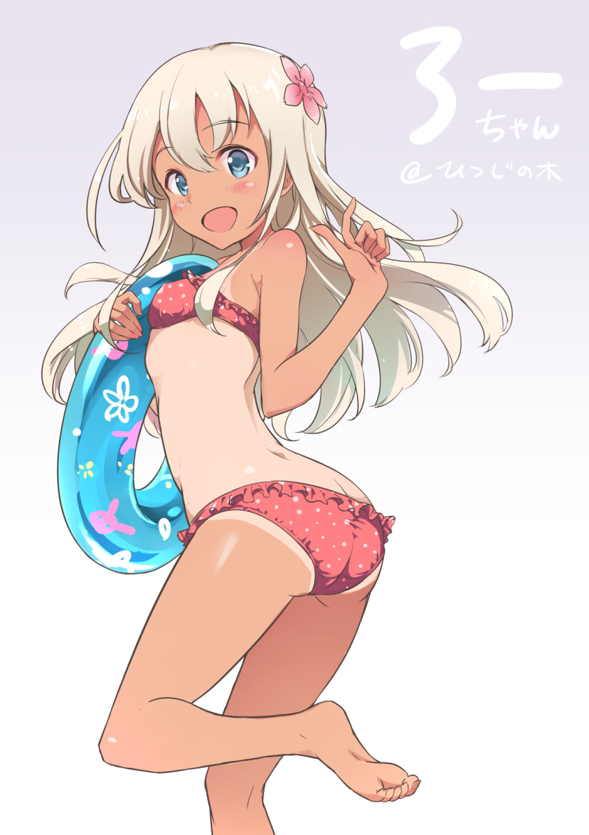 1girl arm_up ass back bikini blue_eyes blue_innertube blush commentary flower hair_flower hair_ornament highres holding innertube kantai_collection leg_up legs moupii_(hitsuji_no_ki) one-piece_tan open_mouth pink_swimsuit polka_dot rabbit ro-500_(kantai_collection) smile solo swimsuit tan tanline white_hair