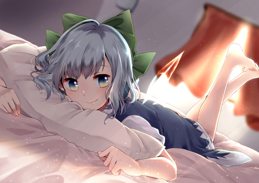 1girl bangs barefoot bed_sheet bedroom blue_dress blue_eyes blue_hair blush bow cirno closed_mouth commentary_request curtains day dress dutch_angle green_bow hair_bow ice ice_wings indoors kuromame_(8gou) legs_up looking_at_viewer on_bed pillow short_hair short_sleeves smile solo sunlight touhou transparent_wings window wings