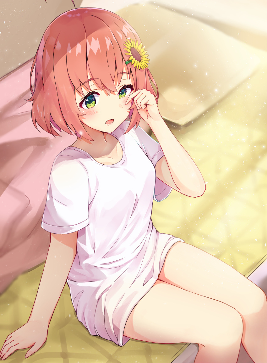 1girl absurdres ahoge bangs blush breasts collarbone commentary_request drooling eyebrows_visible_through_hair eyelashes flower green_eyes hair_between_eyes hair_flower hair_ornament highres himawari_honma indoors medium_breasts nijisanji on_bed open_mouth orange_hair racchi. rubbing_eyes shirt short_hair sitting sitting_on_bed sleepy sunflower_hair_ornament t-shirt virtual_youtuber waking_up white_shirt