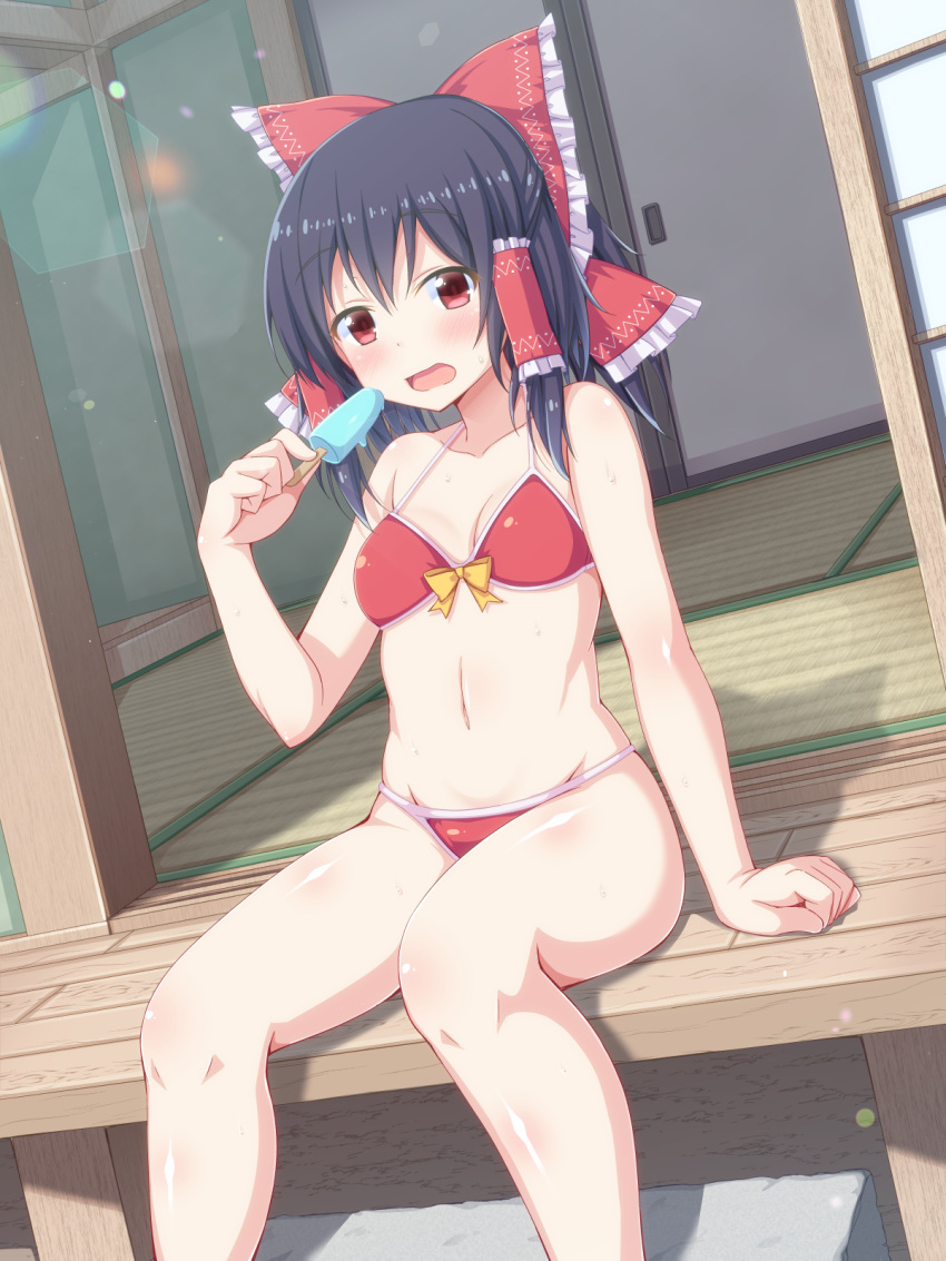 1girl adapted_costume bangs bare_arms bare_legs bare_shoulders bikini black_hair blush bow breasts collarbone commentary_request day dutch_angle eating eyebrows_visible_through_hair feet_out_of_frame food frills front-tie_bikini front-tie_top hair_bow hair_tubes hakurei_reimu highres holding holding_food lens_flare medium_hair navel on_floor open_mouth outdoors ponytail popsicle red_bikini red_bow red_eyes shefu shiny shiny_hair sidelocks sitting small_breasts solo swimsuit tatami touhou wooden_floor yellow_bow