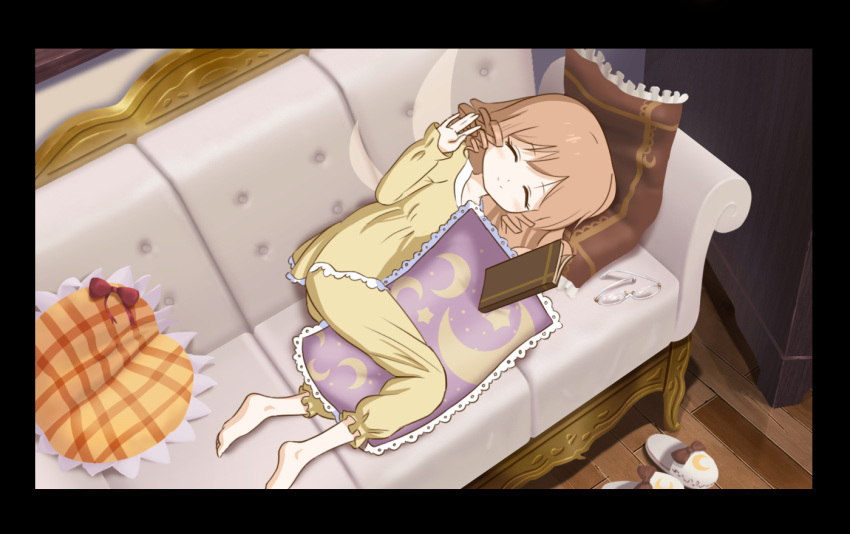 1girl bangs barefoot birijian black_border book border bow brown_bow brown_hair closed_eyes closed_mouth commentary_request couch crescent drill_hair fairy_wings glasses hand_up holding holding_book indoors long_sleeves luna_child lying on_side pillow red_bow short_hair sleepwear slippers smile solo touhou video_with_sound wings wooden_floor