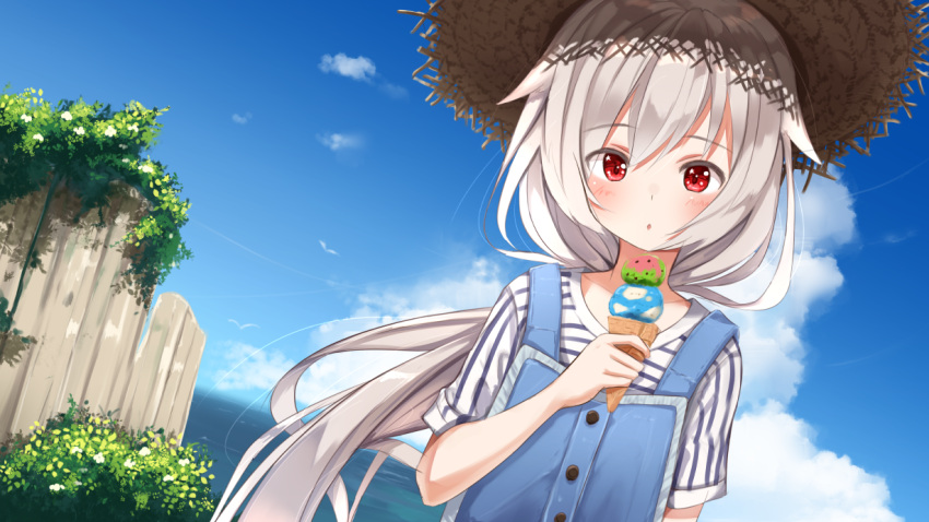1girl :o ame. azur_lane bangs blue_sky blush cliff clouds commentary_request day double_scoop dutch_angle eyebrows_visible_through_hair food hair_between_eyes hat holding holding_food horizon ice_cream ice_cream_cone long_hair looking_at_viewer montpelier_(azur_lane) ocean outdoors overalls parted_lips red_eyes shirt short_sleeves silver_hair sky solo straw_hat striped striped_shirt very_long_hair water