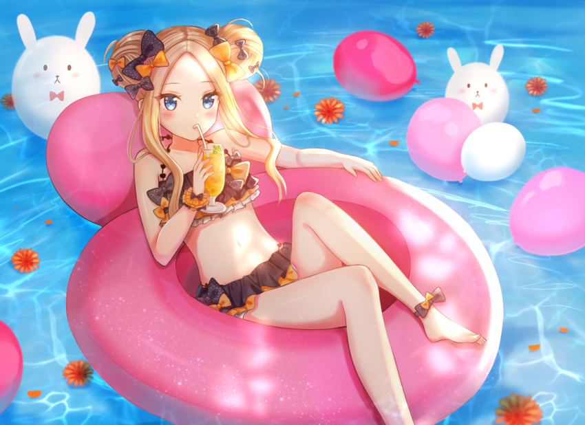1girl abigail_williams_(fate/grand_order) afloat ankle_bow ankle_ribbon bangs bare_arms bare_shoulders barefoot bendy_straw bikini black_bikini black_bow blue_eyes blush bow commentary cup double_bun drink drinking_glass drinking_straw fate/grand_order fate_(series) flower forehead holding holding_drinking_glass innertube looking_at_viewer nasii orange_bow orange_flower parted_bangs petals petals_on_liquid polka_dot polka_dot_bow ribbon side_bun solo swimsuit water