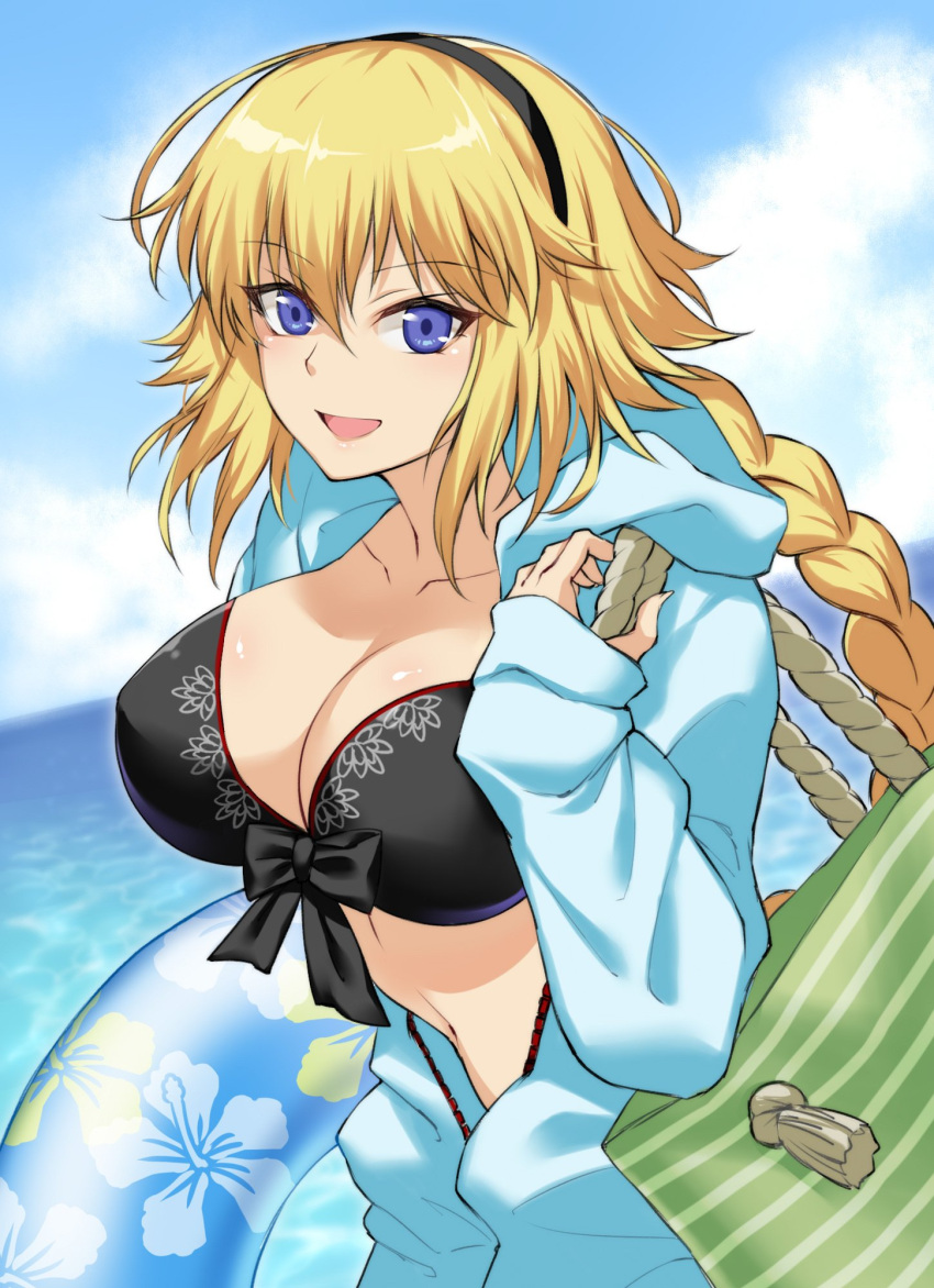 1girl bangs bikini black_bikini black_hairband black_scrunchie blonde_hair blue_eyes blue_hoodie blue_sky breasts cleavage clouds cloudy_sky collarbone commentary_request cowboy_shot day fate/grand_order fate_(series) front-tie_top hair_between_eyes hair_ornament hair_scrunchie hairband highres hood hood_down hoodie innertube jeanne_d'arc_(fate)_(all) jeanne_d'arc_(swimsuit_archer) large_breasts long_hair long_sleeves looking_at_viewer nasaniliu navel ocean open_clothes open_hoodie open_mouth outdoors scrunchie sky solo standing swimsuit