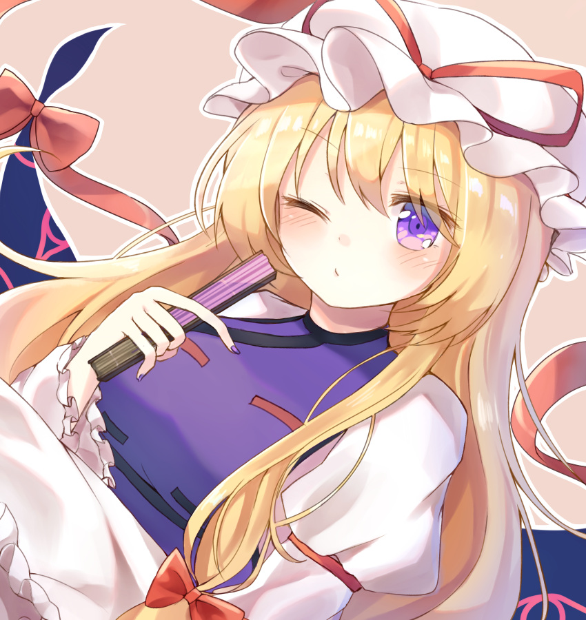 1girl blonde_hair blush eyebrows_visible_through_hair fan hat highres long_hair nail_polish one_eye_closed pudding_(skymint_028) purple_nails simple_background solo touhou upper_body violet_eyes white_hat yakumo_yukari