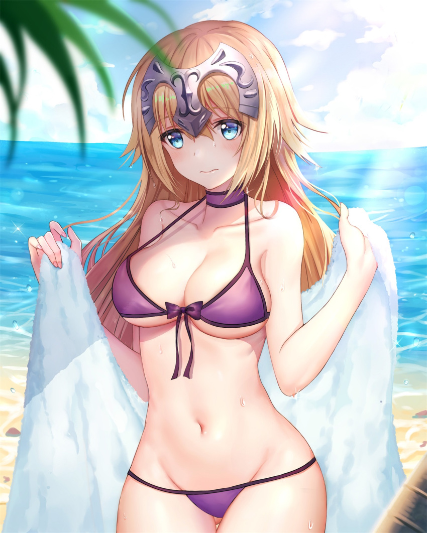 1girl beach bikini blue_eyes blue_sky breasts choker closed_mouth clouds day embarrassed eyebrows_visible_through_hair fate/grand_order fate_(series) headpiece highres jeanne_d'arc_(fate) jeanne_d'arc_(fate)_(all) large_breasts looking_at_viewer luobo_(nsnr8754) navel ocean purple_bikini purple_choker sky solo standing swimsuit towel wavy_mouth wet