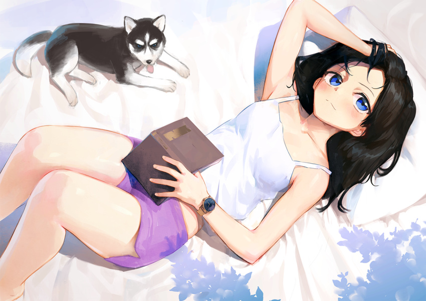 1girl bare_legs barefoot black_hair blue_eyes blush book boyshorts closed_mouth commentary_request dog feet_out_of_frame hand_in_hair holding holding_book husky looking_at_viewer lying on_back open_book original pillow shirt smile solo treeware watch watch white_shirt