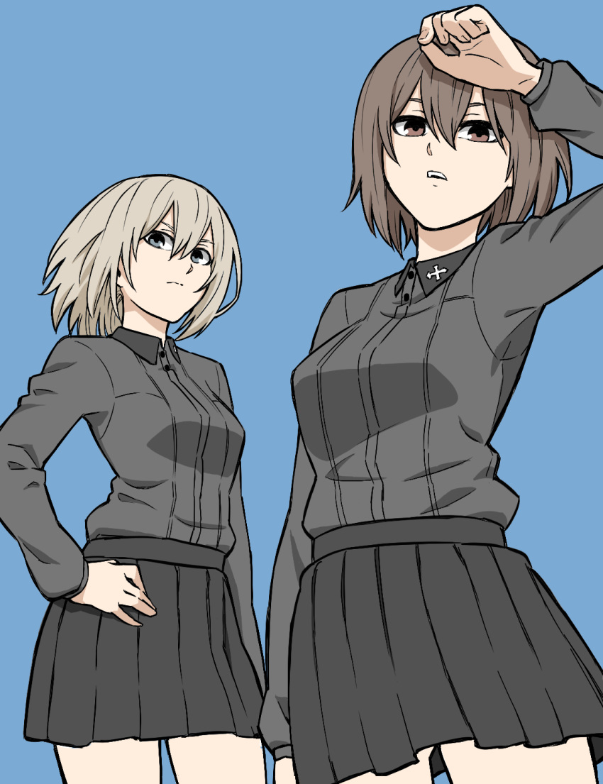 2girls black_skirt blue_background brown_eyes brown_hair cowboy_shot from_below girls_und_panzer hand_on_hip highres itsumi_erika kuromorimine_military_uniform looking_at_viewer looking_down miniskirt multiple_girls nishizumi_maho parted_lips pleated_skirt silver_hair simple_background skirt tuskryo