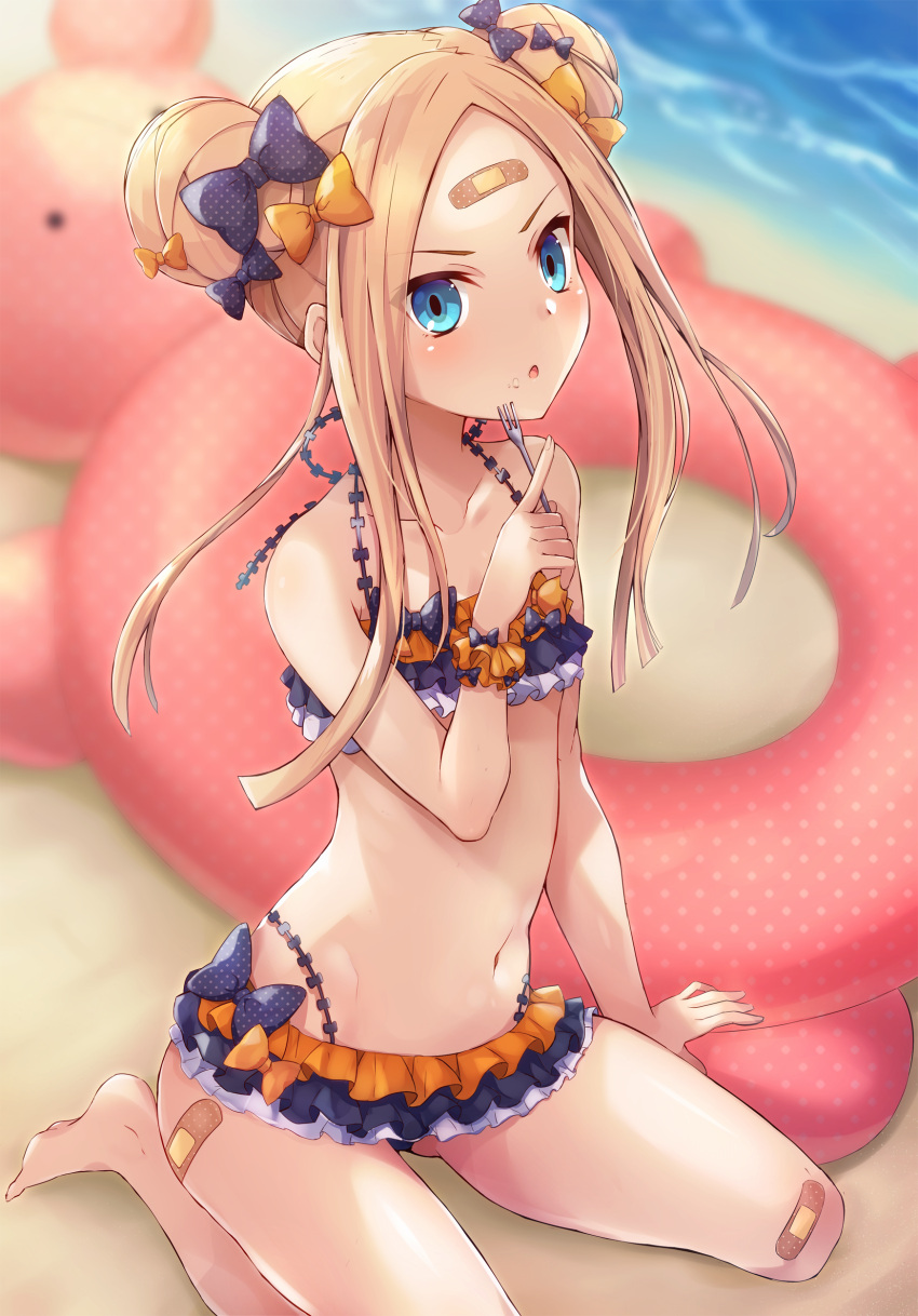 1girl :o abigail_williams_(fate/grand_order) absurdres arm_support bandaid bandaid_on_ass bandaid_on_forehead bandaid_on_knee bare_legs bare_shoulders barefoot beach bikini black_bikini black_bow blonde_hair blue_eyes blurry blurry_background blush bow collarbone commentary_request day depth_of_field double_bun emerald_float fate/grand_order fate_(series) food food_on_face fork hair_bow highres holding holding_fork innertube long_hair navel orange_bow orange_scrunchie outdoors parted_lips polka_dot polka_dot_bow samoore sand scrunchie side_bun sidelocks sitting solo swimsuit wariza water wrist_scrunchie