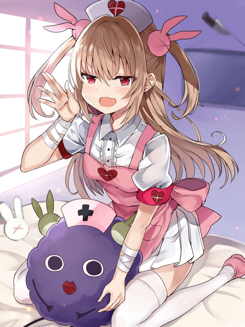 1girl :d apron bandage bangs blush bunny_hair_ornament hair_ornament hand_up hat highres inside light_brown_hair long_hair looking_at_viewer natori_sana nurse_cap on_bed open_mouth pink_apron pink_footwear pink_hat red_eyes retsuto sana_channel short_sleeves smile solo thigh-highs two_side_up virtual_youtuber white_legwear window