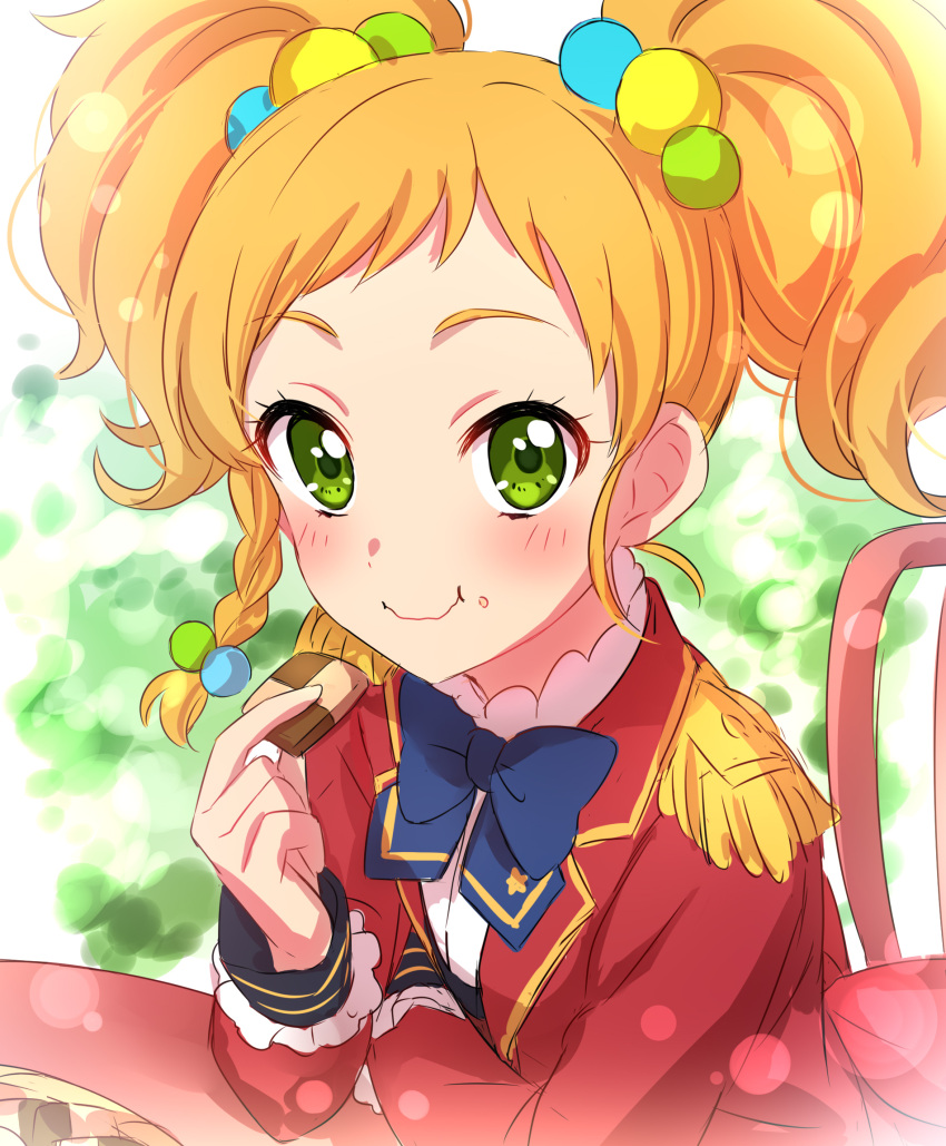 1girl :t aikatsu!_(series) aikatsu_stars! blue_neckwear blush bow bowtie braid checkerboard_cookie chocolate closed_mouth commentary_request cookie eating epaulettes food food_on_face green_eyes hair_bobbles hair_ornament highres holding holding_food jacket lens_flare lens_flare_abuse long_sleeves looking_at_viewer multicolored_hair_bobbles nikaidou_yuzu orange_hair red_jacket s4_uniform sekina short_hair side_braid single_braid smile solo twintails wavy_mouth