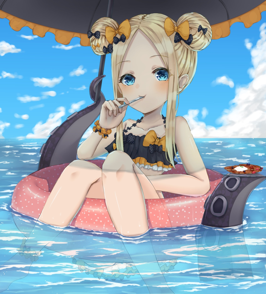 1girl abigail_williams_(fate/grand_order) bangs bao_(s_888) bare_arms bare_legs bare_shoulders barefoot bikini black_bikini black_bow black_umbrella blonde_hair blue_eyes blue_sky blueberry blush bow closed_mouth clouds collarbone commentary_request day double_bun emerald_float eyebrows_visible_through_hair fate/grand_order fate_(series) fingernails food fork fork_in_mouth fruit hair_bow head_tilt highres holding holding_fork horizon long_hair looking_at_viewer ocean orange_bow orange_scrunchie outdoors pancake parted_bangs plate polka_dot polka_dot_bow scrunchie side_bun sidelocks sky soaking_feet solo suction_cups swimsuit tentacle transparent umbrella water wrist_scrunchie