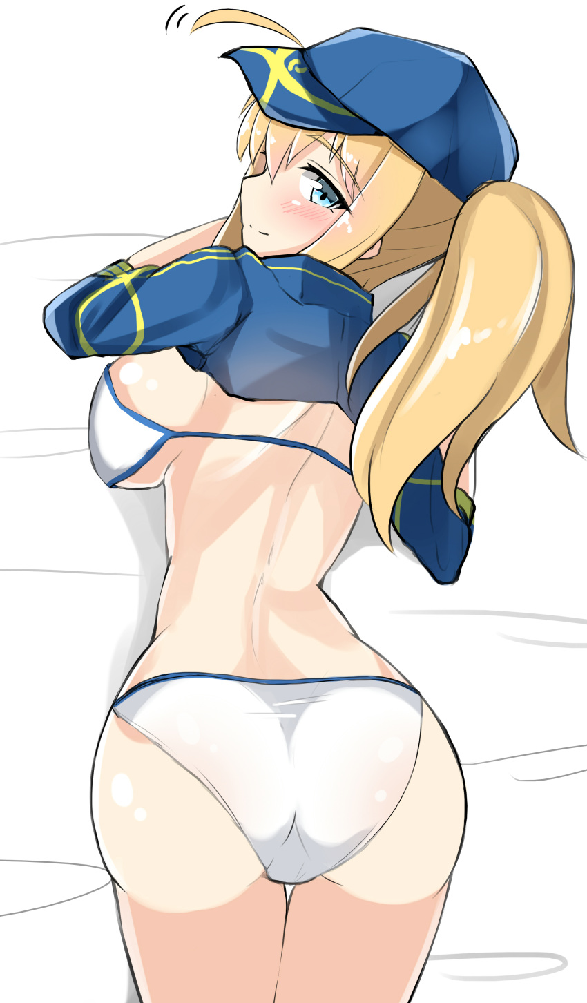 1girl absurdres ahoge artoria_pendragon_(all) ass bangs baseball_cap bed_sheet bikini blonde_hair blue_eyes blue_hat blue_jacket blush breast_press breasts closed_mouth cropped_jacket eyebrows_visible_through_hair fate/grand_order fate_(series) hair_between_eyes hair_through_headwear hat highres jacket large_breasts long_hair looking_at_viewer looking_back lying moyoron mysterious_heroine_xx_(foreigner) on_stomach ponytail short_sleeves smile solo swimsuit white_bikini