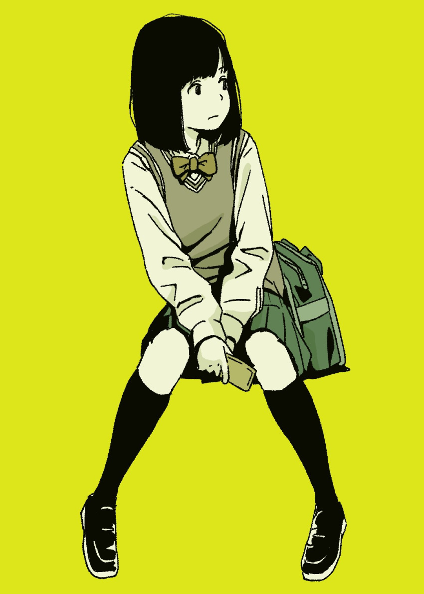 1girl between_legs black_footwear black_hair black_legwear bob_cut closed_mouth commentary_request facing_viewer flat_color frown full_body green_bag hand_between_legs highres holding holding_phone hosoo kneehighs long_sleeves looking_to_the_side monochrome original phone school_uniform short_hair simple_background solo v_arms yellow_background