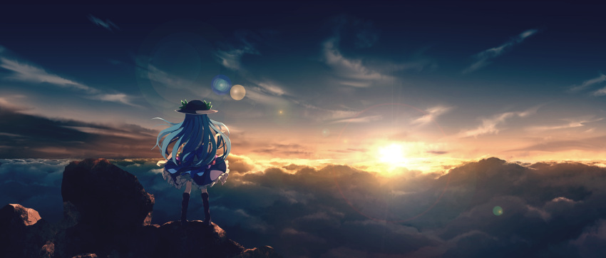 1girl above_clouds black_footwear black_hat blue_hair blue_skirt boots clouds commentary_request dise from_behind full_body hand_up hat highres hinanawi_tenshi leaf lens_flare long_hair outdoors petticoat rock scenery shirt skirt solo standing sun sunrise touhou white_shirt