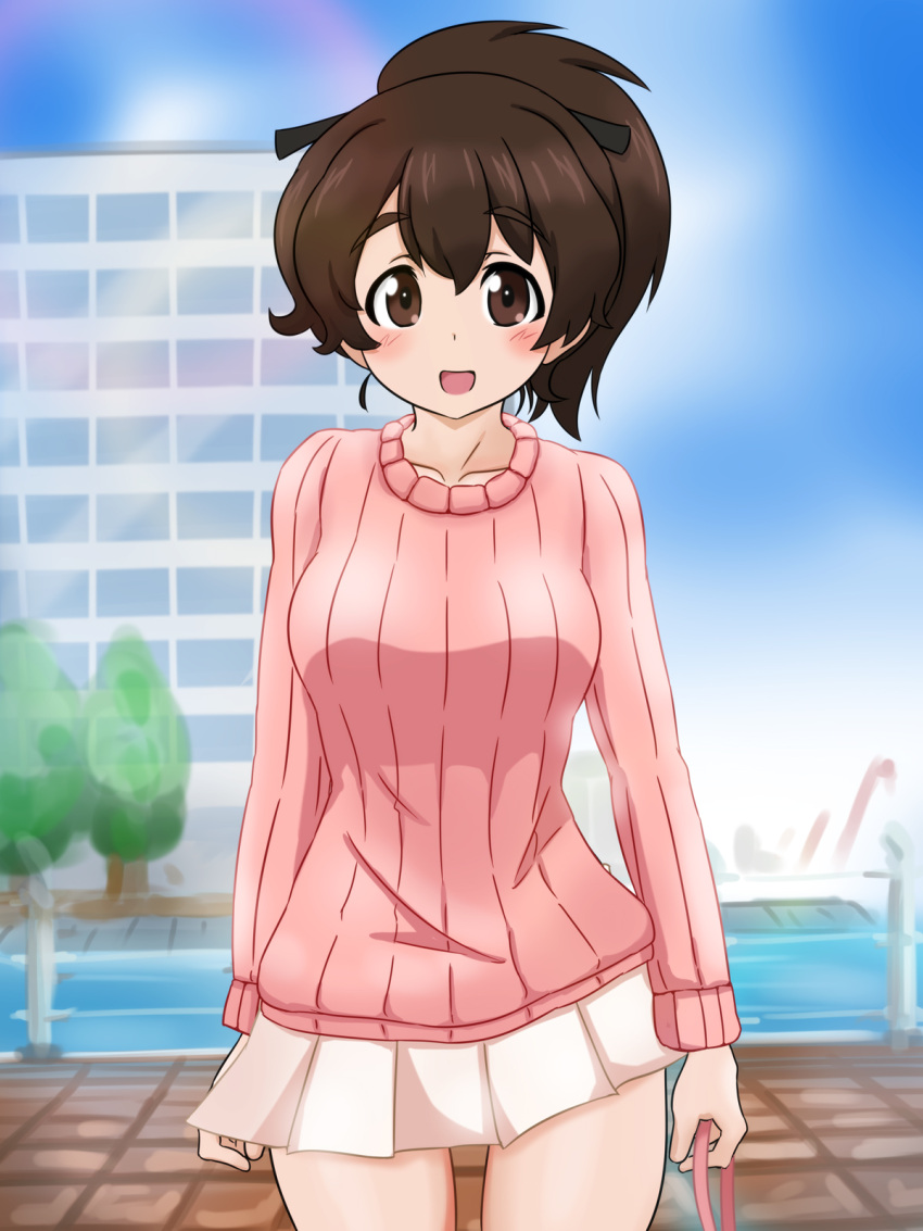 1girl :d bangs black_ribbon blue_sky blurry blurry_background blush brown_eyes brown_hair casual cowboy_shot day depth_of_field eyebrows_visible_through_hair fechisupi girls_und_panzer hair_ribbon highres holding koyama_yuzu long_sleeves looking_at_viewer miniskirt open_mouth outdoors pink_sweater pleated_skirt ribbed_sweater ribbon short_hair short_ponytail skirt sky smile solo standing sweater white_skirt