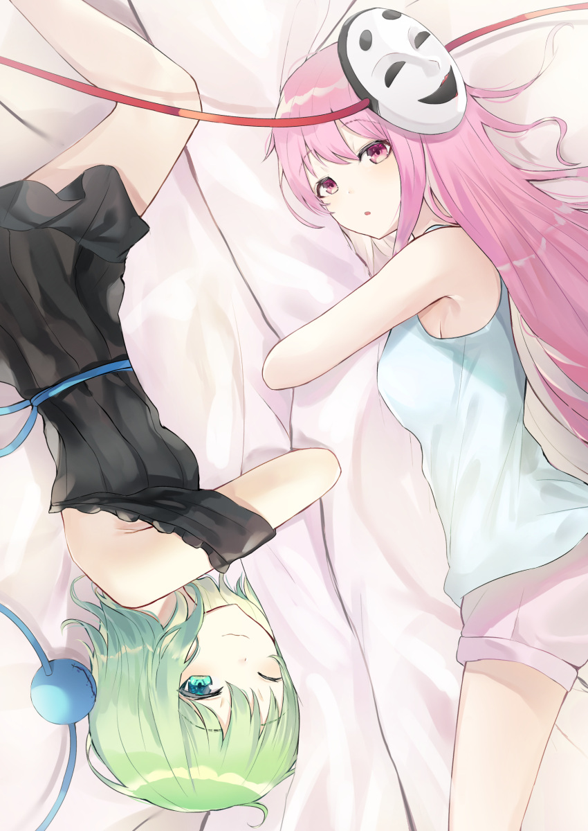 2girls ;) absurdres bangs bare_arms bare_shoulders bed_sheet black_dress blue_sash blue_tank_top blush breasts commentary_request cowboy_shot dress eyebrows_visible_through_hair feet_out_of_frame green_eyes green_hair hata_no_kokoro highres komeiji_koishi long_hair looking_at_viewer lying mask mask_on_head medium_breasts multiple_girls object_hug off-shoulder_dress off_shoulder on_side one_eye_closed parted_lips pink_eyes pink_hair pink_shorts rice_(okome_no_naru_ki) sash short_hair short_shorts shorts smile tank_top thighs third_eye touhou upside-down