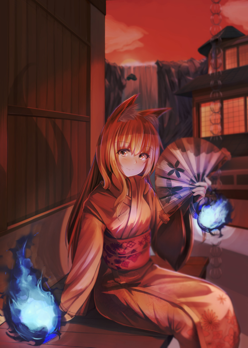 1girl animal_ears artist_request blue_fire blush commentary_request evening eyebrows_visible_through_hair fan fire floral_print fox_ears fox_girl highres holding holding_fan japanese_clothes kimono long_hair long_sleeves looking_at_viewer obi orange_sky original paper_fan red_eyes redhead sash sitting sky solo water waterfall wide_sleeves yukata
