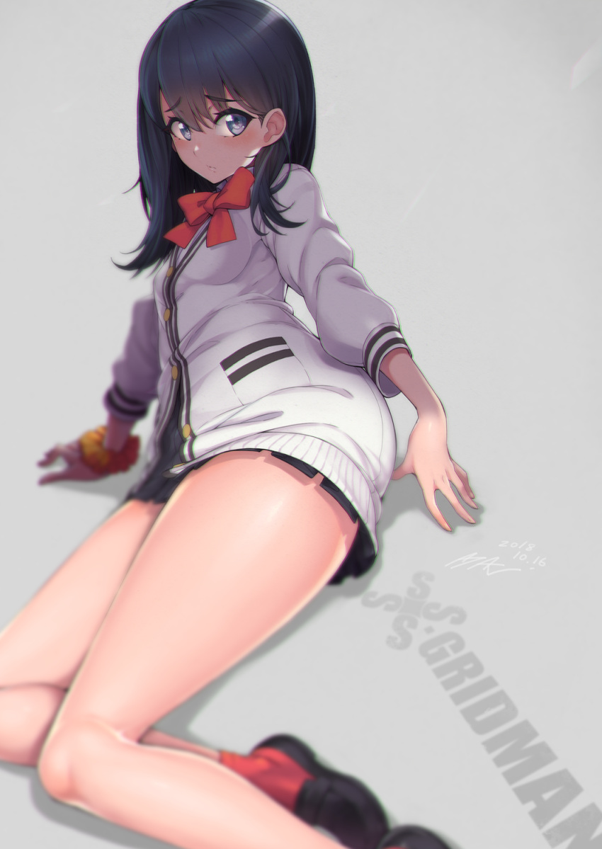 1girl ayaki bangs black_hair black_skirt blue_eyes blush cardigan closed_mouth commentary_request eyebrows_visible_through_hair highres loafers long_hair long_sleeves looking_at_viewer lying on_side pleated_skirt red_legwear red_neckwear school_uniform scrunchie shirt shoes skirt solo ssss.gridman takarada_rikka thighs white_shirt wrist_scrunchie