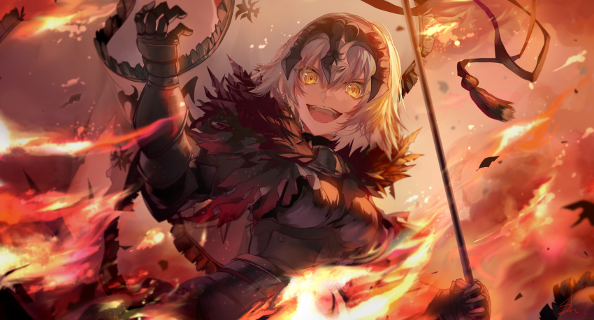 1girl armor armored_dress bangs banner black_dress breasts capelet chains commentary_request dress evil_smile eyebrows_visible_through_hair fate/grand_order fate_(series) fire fur-trimmed_capelet fur_trim gauntlets grey_hair headphones highres holding jeanne_d'arc_(alter)_(fate) jeanne_d'arc_(fate)_(all) looking_at_viewer medium_breasts outdoors saihate_(d3) short_hair signature smile solo tassel upper_teeth v-shaped_eyebrows yellow_eyes