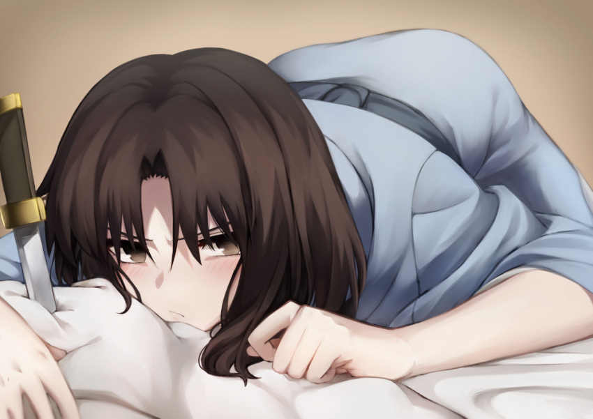 1girl bed_sheet blue_kimono blush brown_background brown_eyes brown_hair highres japanese_clothes kara_no_kyoukai kimono knife looking_at_viewer lying okakasushi on_stomach ryougi_shiki short_hair solo